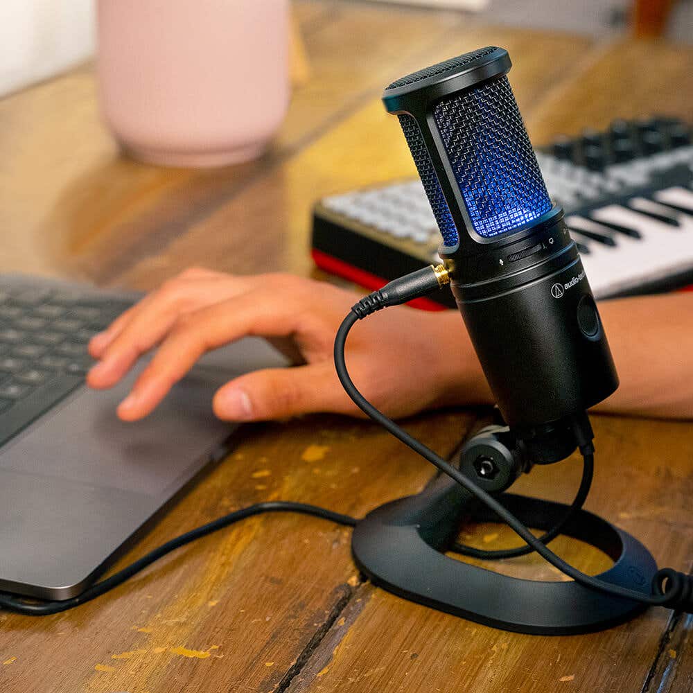 AT2020USB-X Cardioid Condenser USB Microphone with laptop and keyboard