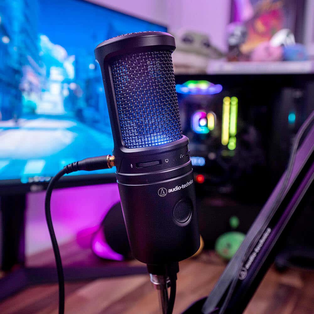 2020USB-X Cardioid Condenser USB Microphone shown with PC gaming computer
